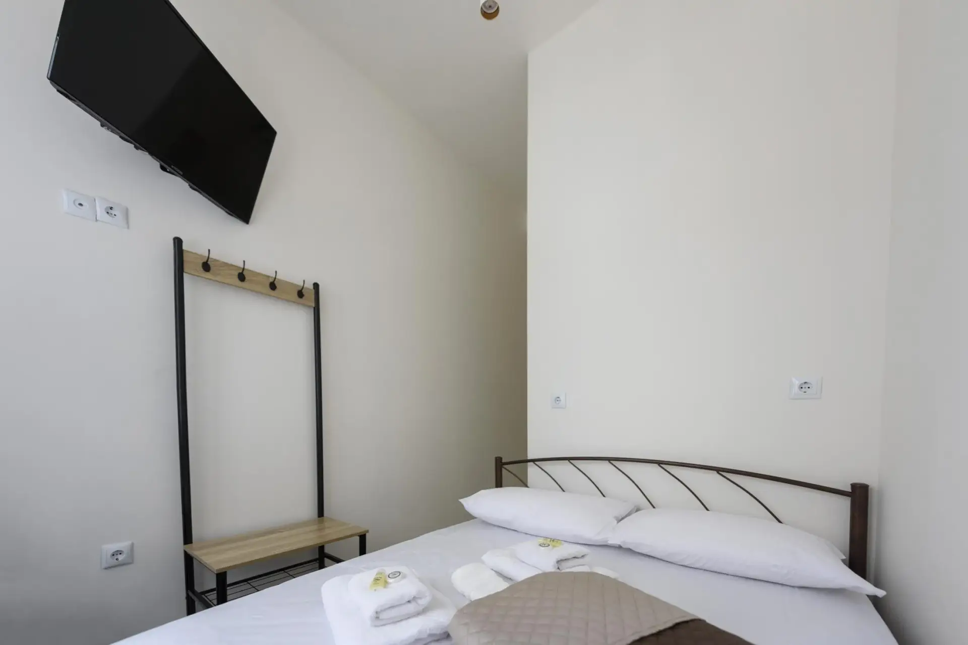 Picture of a double bed in a room