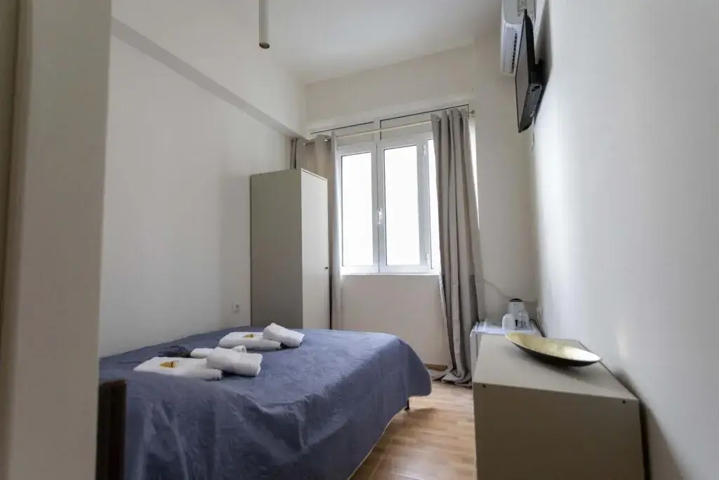 Picture of a double bed in a room