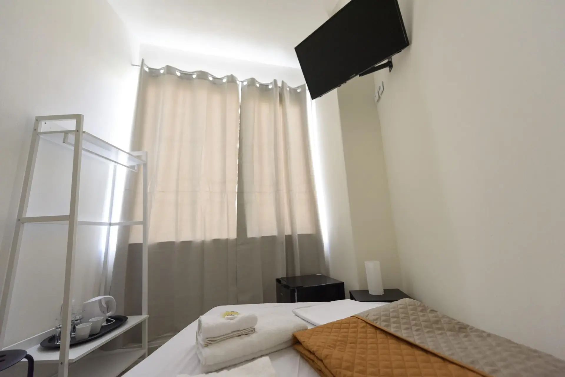 Picture of a double bed in a room
