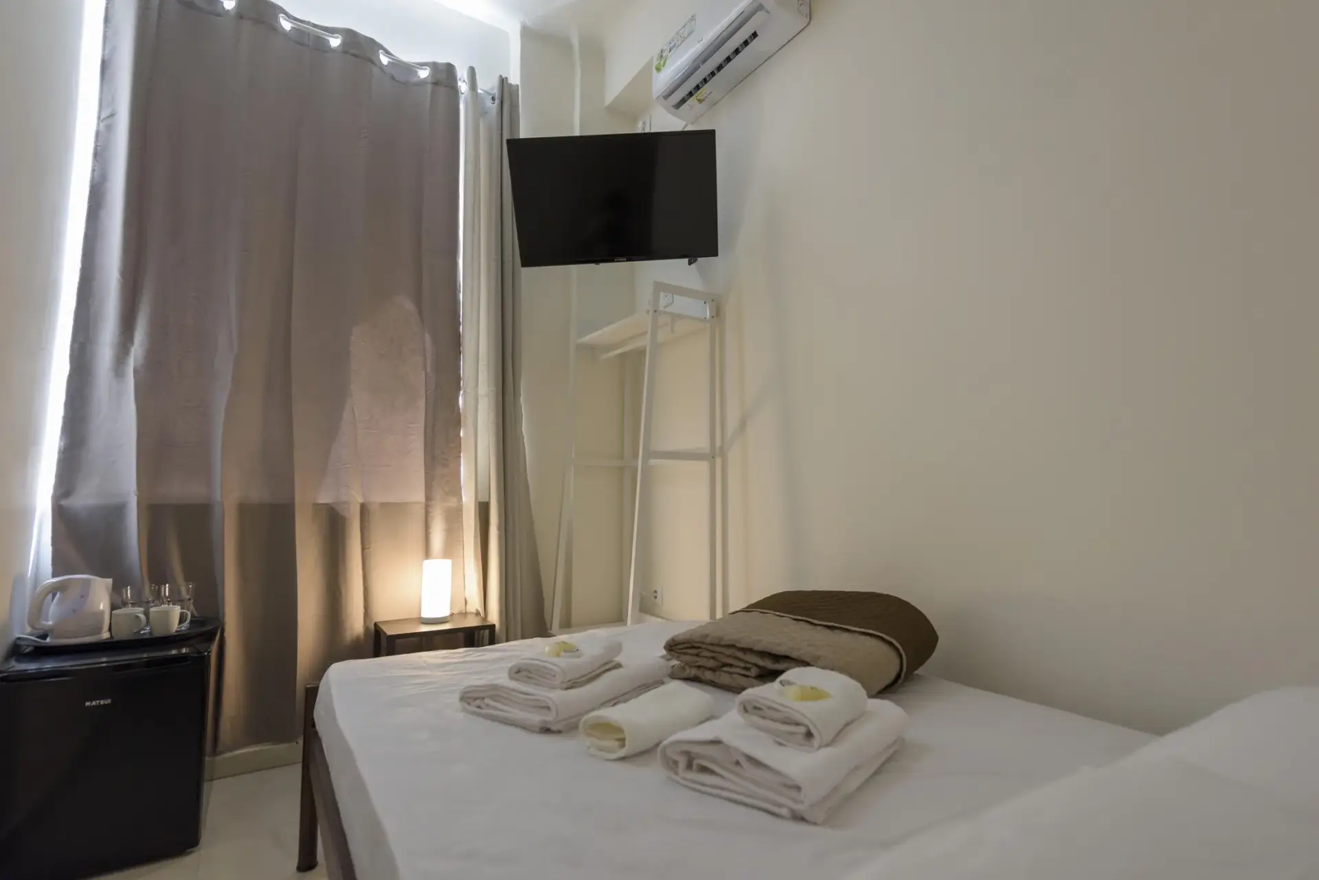 Picture of a double bed in a room