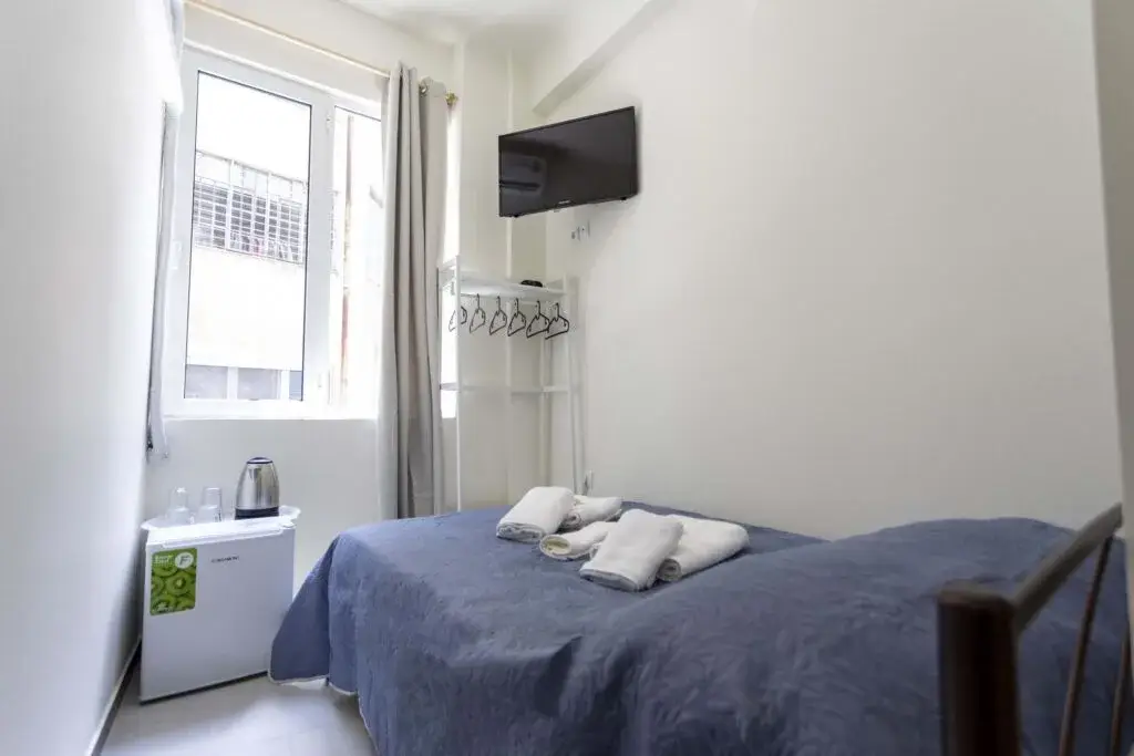 Picture of a double bed in a room